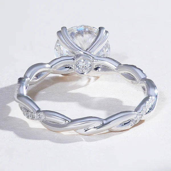 Twisted Love 2 Ct Round Solitaire Ring (heart prongs)