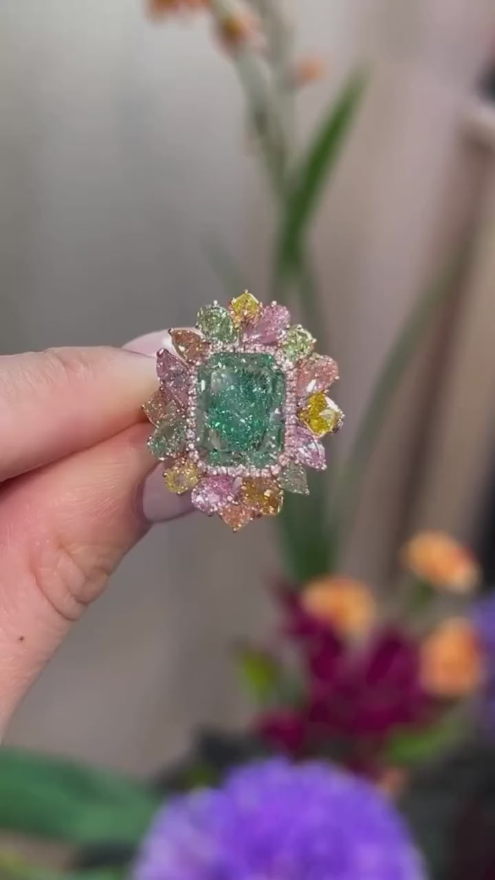 Obsessed with this ring! The green and pink stones are giving me all the vibes. 🌈✨